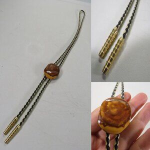 Black & White woven Bolo Tie with polished wood medallion slid with gold tips